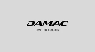 DAMAC logo with tagline "Live the Luxury" on a light gray background.