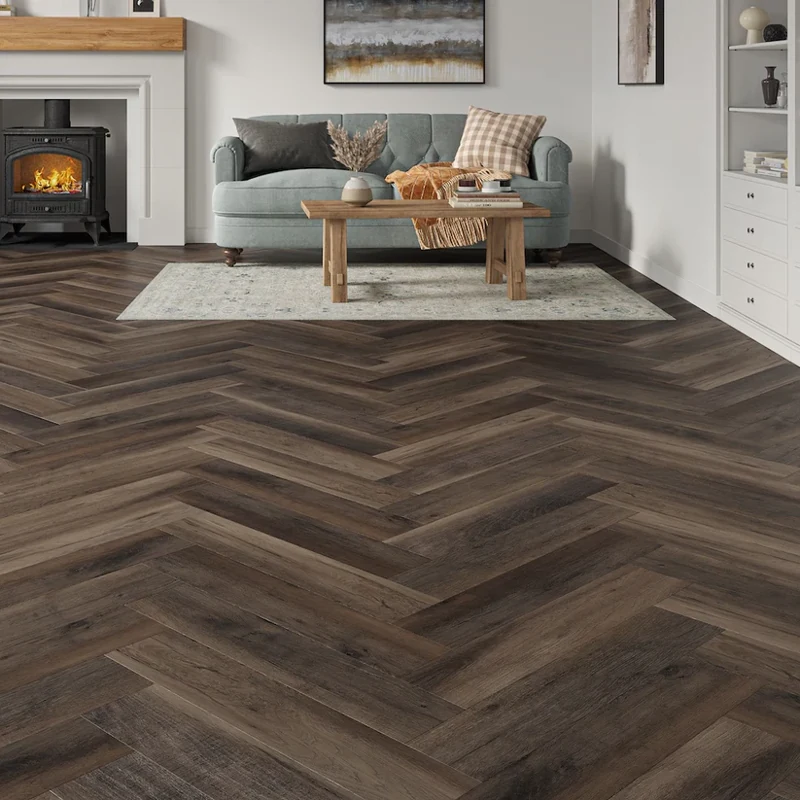 Dark wood SPC flooring in herringbone layout