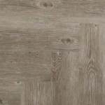 Detail of interlocking light wood herringbone planks