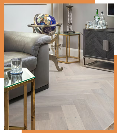 Modern living room with herringbone spc flooring in Dubai and stylish decor.