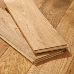 Close Up Of Two Oak Floor Planks On Wood Flooring