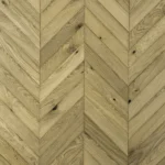 Top Down View Of Light Oak Chevron Parquet Flooring